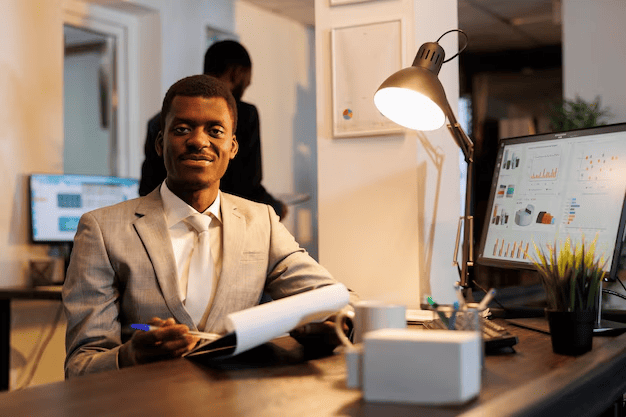 african american manager holding clipboard analyzing marketing statistics working hours company strategy startup office smiling business man looking papers with investment graph 482257 59468